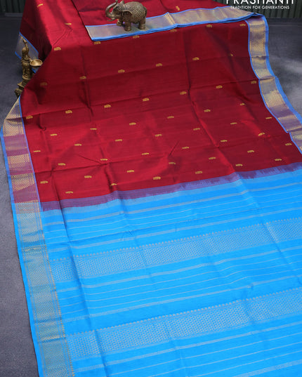 Silk cotton saree maroon and cs blue with zari woven buttas and zari woven border