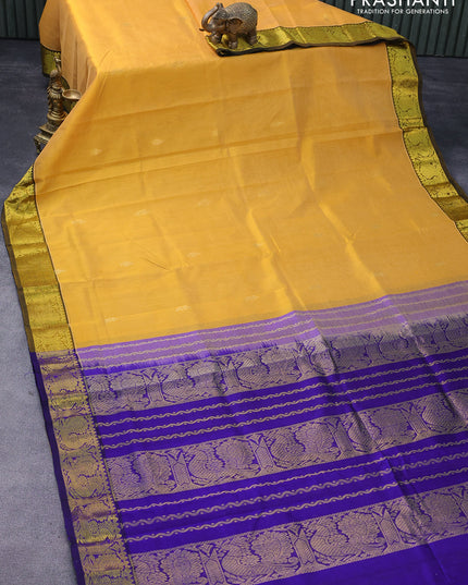 Silk cotton saree mustard yellow and blue with zari woven buttas and annam zari woven border