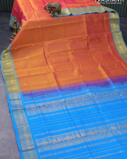 Silk cotton saree dual shade of pinkish mustrad yellow and cs blue with zari woven buttas and annam & rudhraksha zari woven border