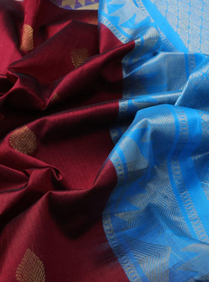 Silk cotton saree maroon and cs blue with zari woven buttas and temple zari woven border