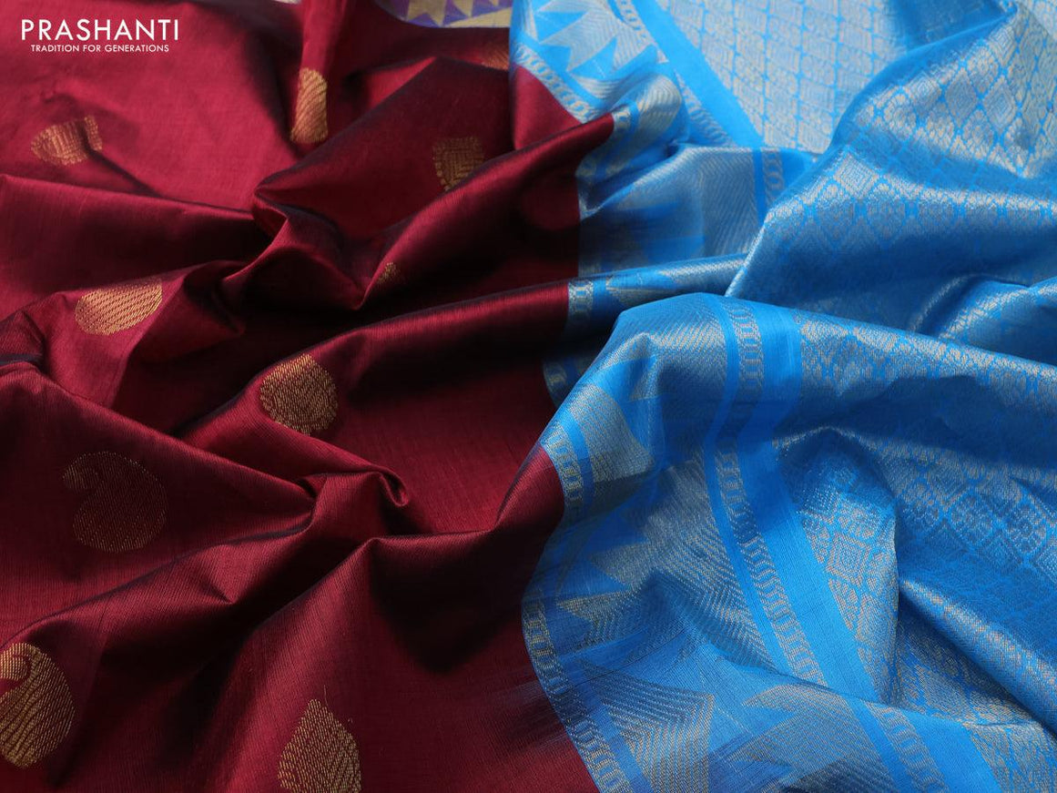 Silk cotton saree maroon and cs blue with zari woven buttas and temple zari woven border