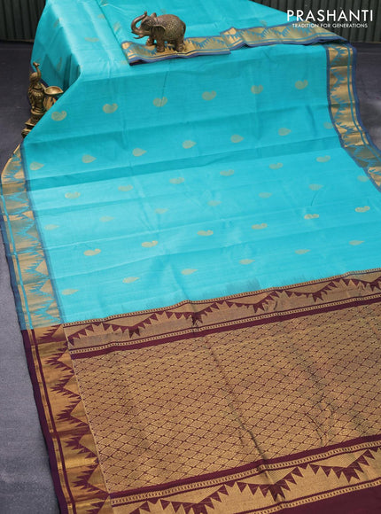 Silk cotton saree teal blue and brown with zari woven buttas and temple zari woven border