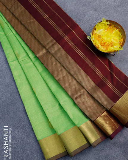 Silk cotton saree light green and deep maroon with paisley zari woven buttas and zari woven border