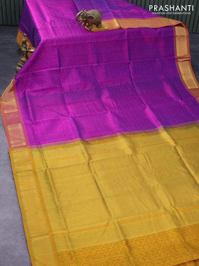 Silk cotton saree purple and mustard yellow with allover self emboss jacquard and zari woven border