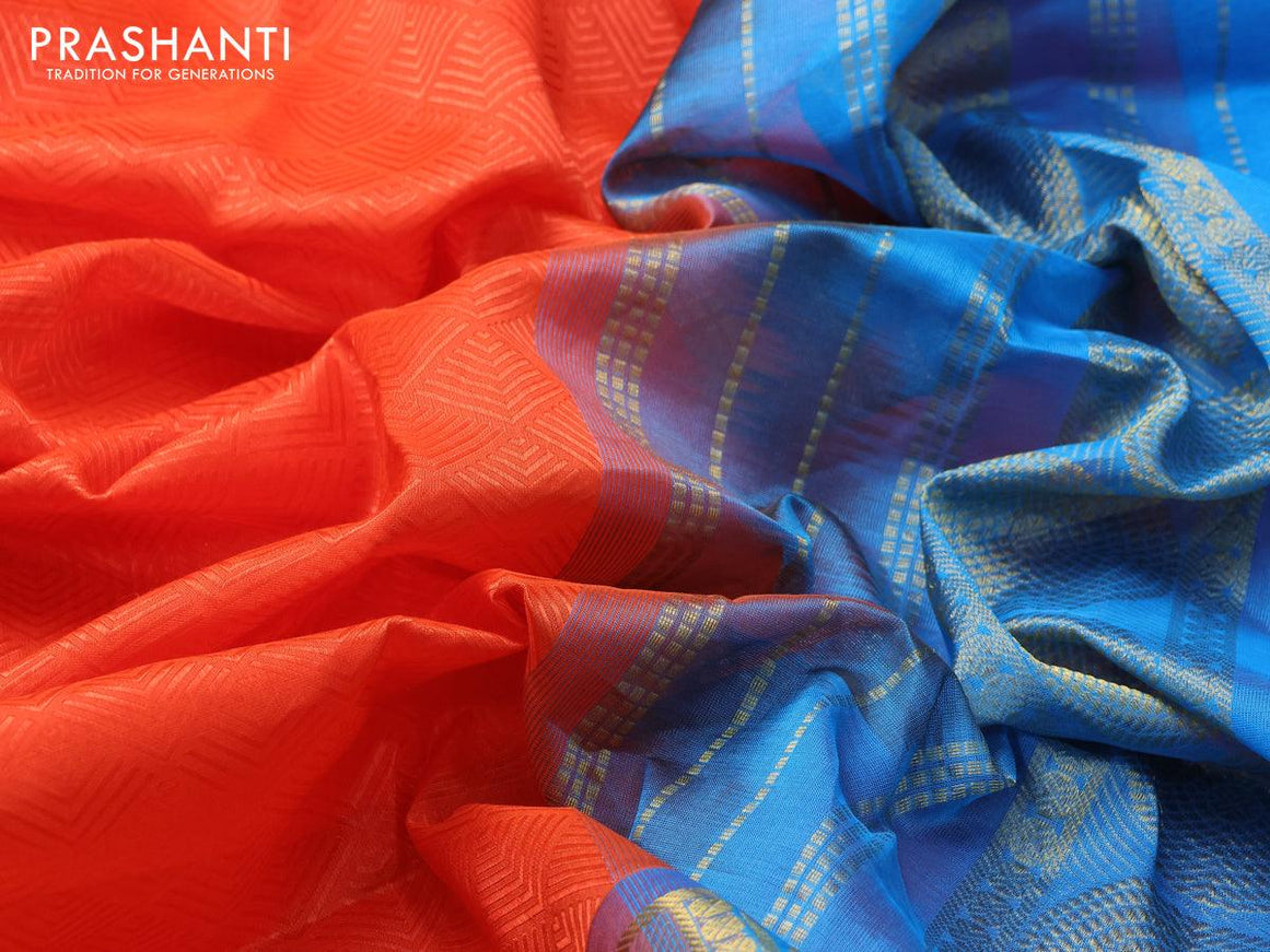 Silk cotton saree orange and light blue with allover self emboss jacquard and zari woven border