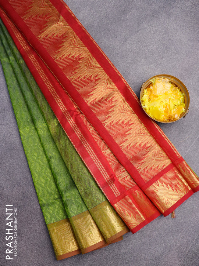 Silk cotton saree light green and maroon with allover self emboss jacquard and temple design zari woven border