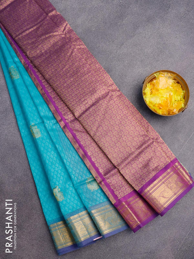 Silk cotton saree teal blue and purple with allover self emboss jacquard & zari buttas and zari woven border