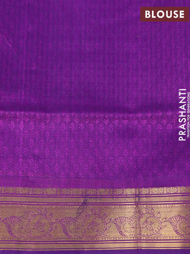 Silk cotton saree teal blue and purple with allover self emboss jacquard & zari buttas and zari woven border