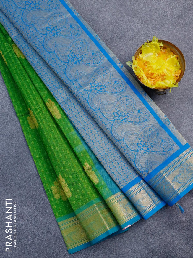 Silk cotton saree green and cs blue with allover self emboss jacquard & zari buttas and zari woven border