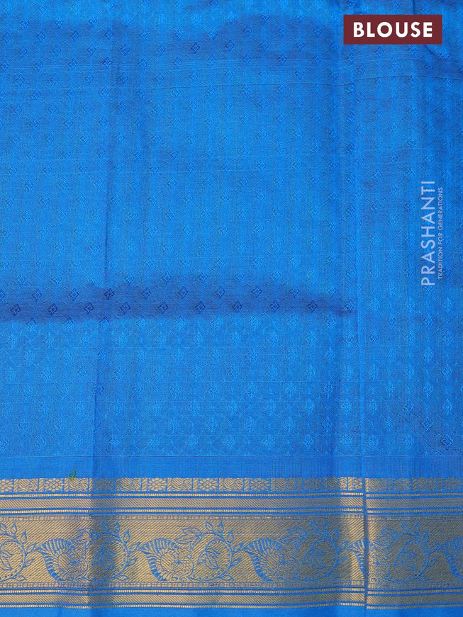 Silk cotton saree green and cs blue with allover self emboss jacquard & zari buttas and zari woven border