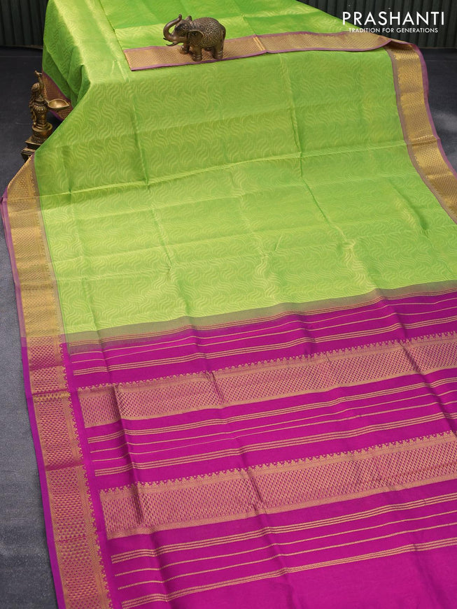 Silk cotton saree fluorescent green and magenta pink with allover self emboss jacquard and zari woven border