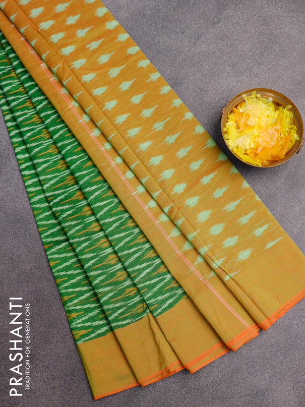 Ikat cotton saree green and dual shade of orange with allover ikat weaves and simple border without blouse