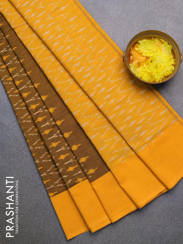 Ikat cotton saree mustard shade and yellow with allover ikat weaves and simple border without blouse