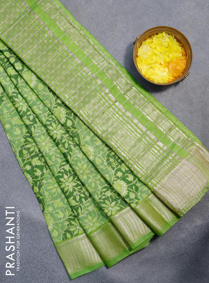 Semi gadwal saree light green with allover floral prints and zari woven border