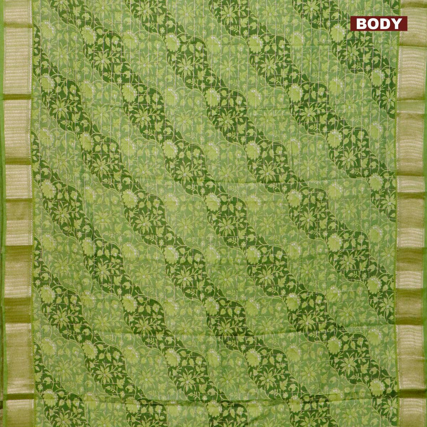 Semi gadwal saree light green with allover floral prints and zari woven border