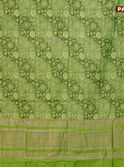 Semi gadwal saree light green with allover floral prints and zari woven border