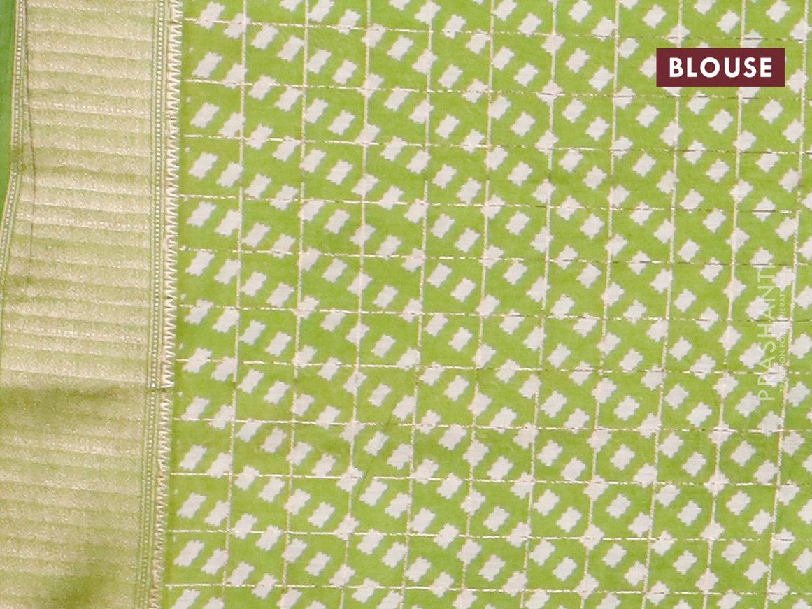 Semi gadwal saree light green with allover floral prints and zari woven border