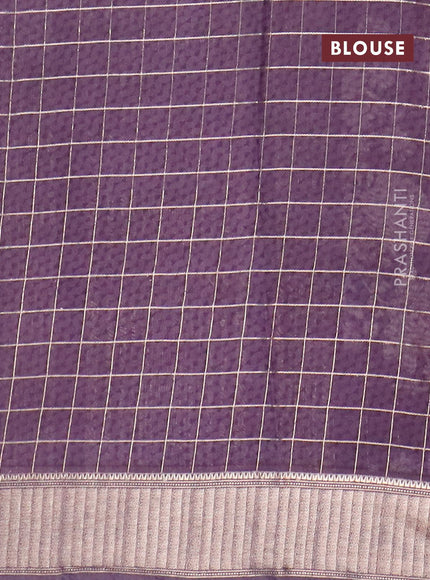 Semi gadwal saree jamun shade with allover zari checks & floral prints and zari woven border