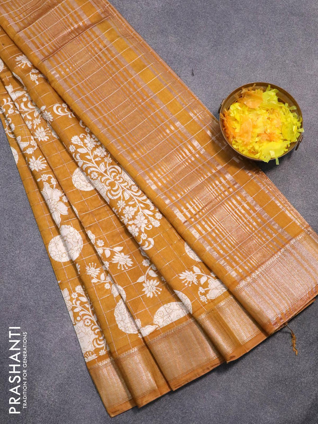 Semi gadwal saree dark mustard with allover zari checks & floral prints and zari woven border