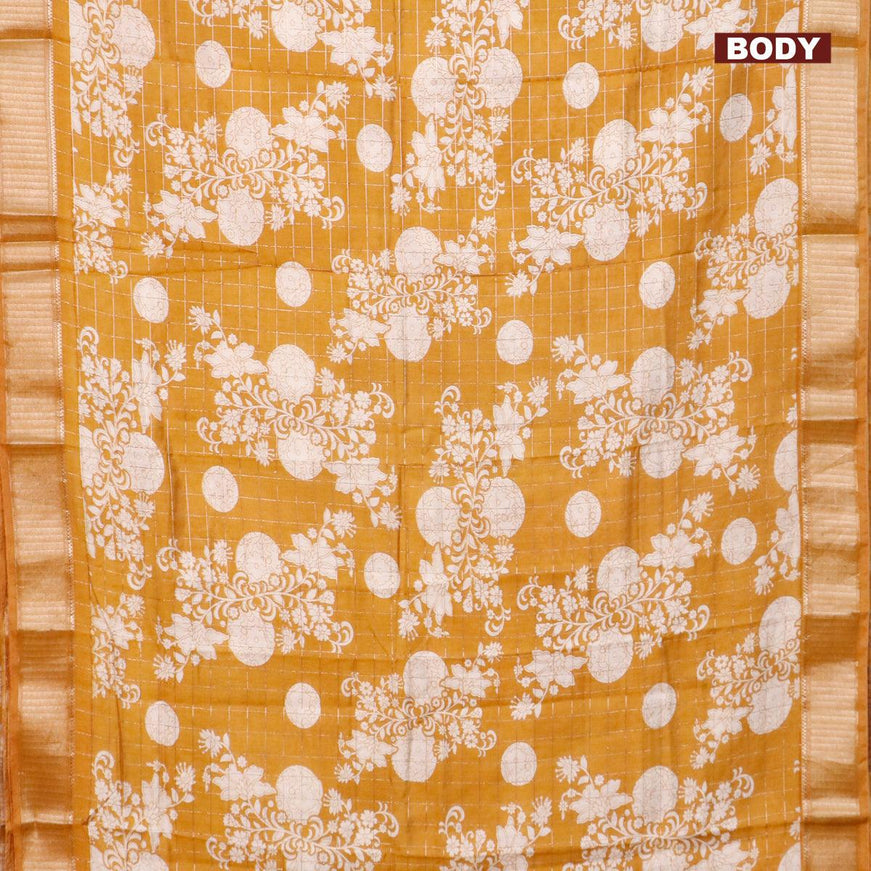 Semi gadwal saree dark mustard with allover zari checks & floral prints and zari woven border