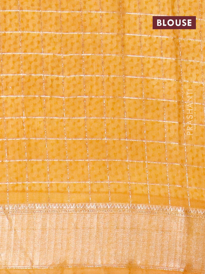 Semi gadwal saree dark mustard with allover zari checks & floral prints and zari woven border