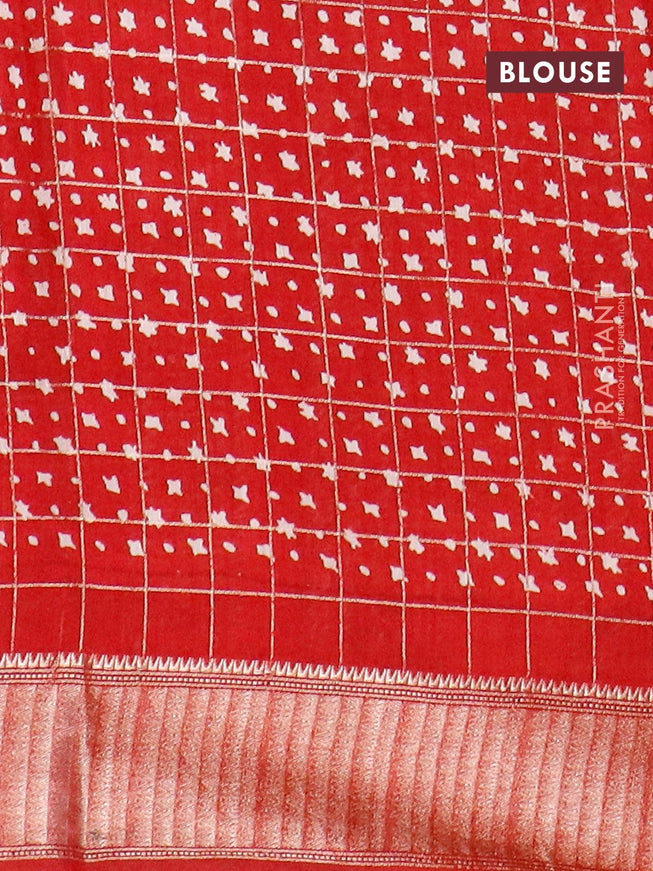 Semi gadwal saree red with allover zari checks & floral prints and zari woven border