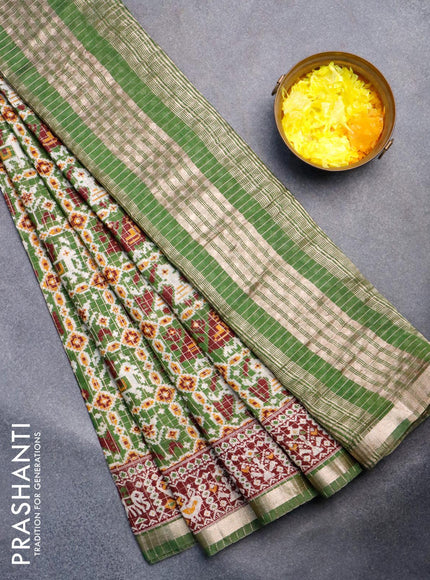 Semi gadwal saree green and maroon with allover small zari checks & ikat prints and small zari woven border