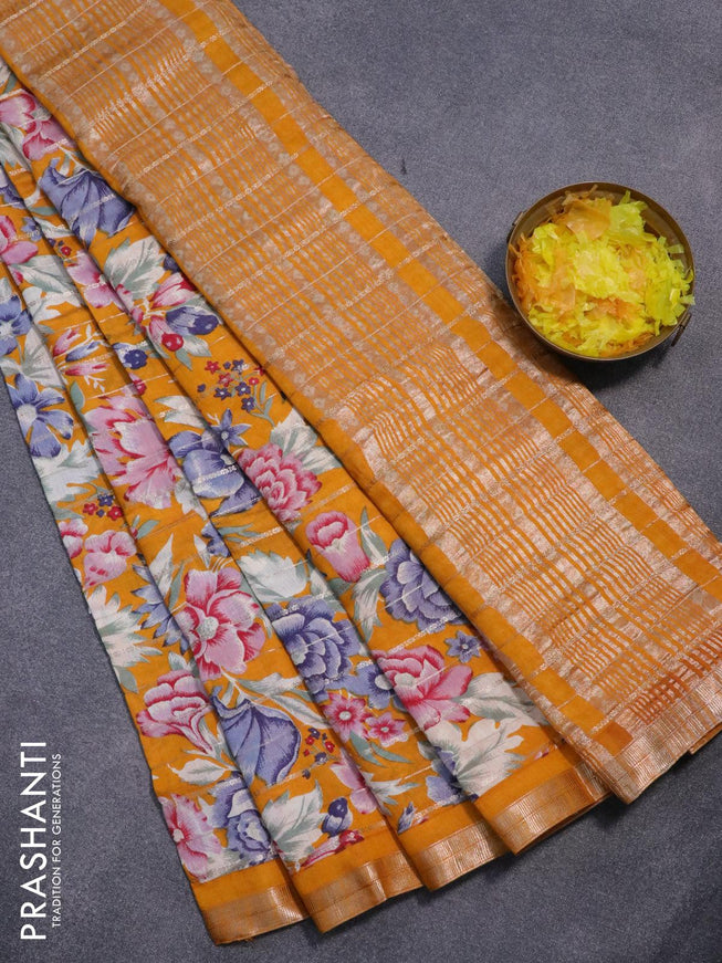 Semi gadwal saree mustard yellow with allover zari strips & floral prints and zari woven border