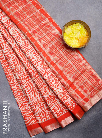 Semi gadwal saree cream and orange with allover zari checks & geometric prints and zari woven border