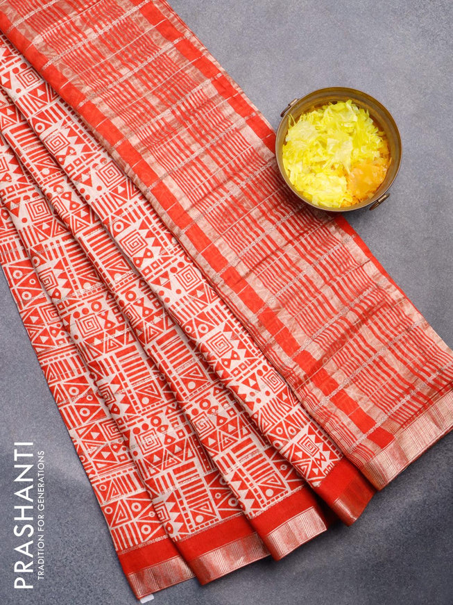 Semi gadwal saree cream and orange with allover zari checks & geometric prints and zari woven border