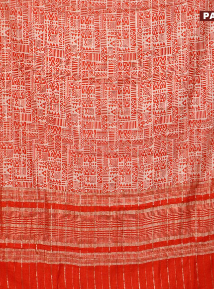 Semi gadwal saree cream and orange with allover zari checks & geometric prints and zari woven border