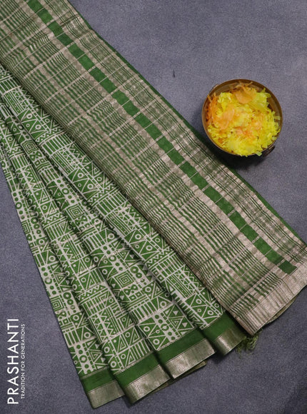 Semi gadwal saree cream and green with allover zari checks & geometric prints and zari woven border