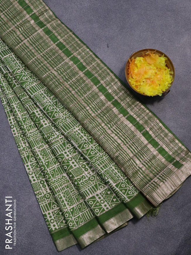 Semi gadwal saree cream and green with allover zari checks & geometric prints and zari woven border