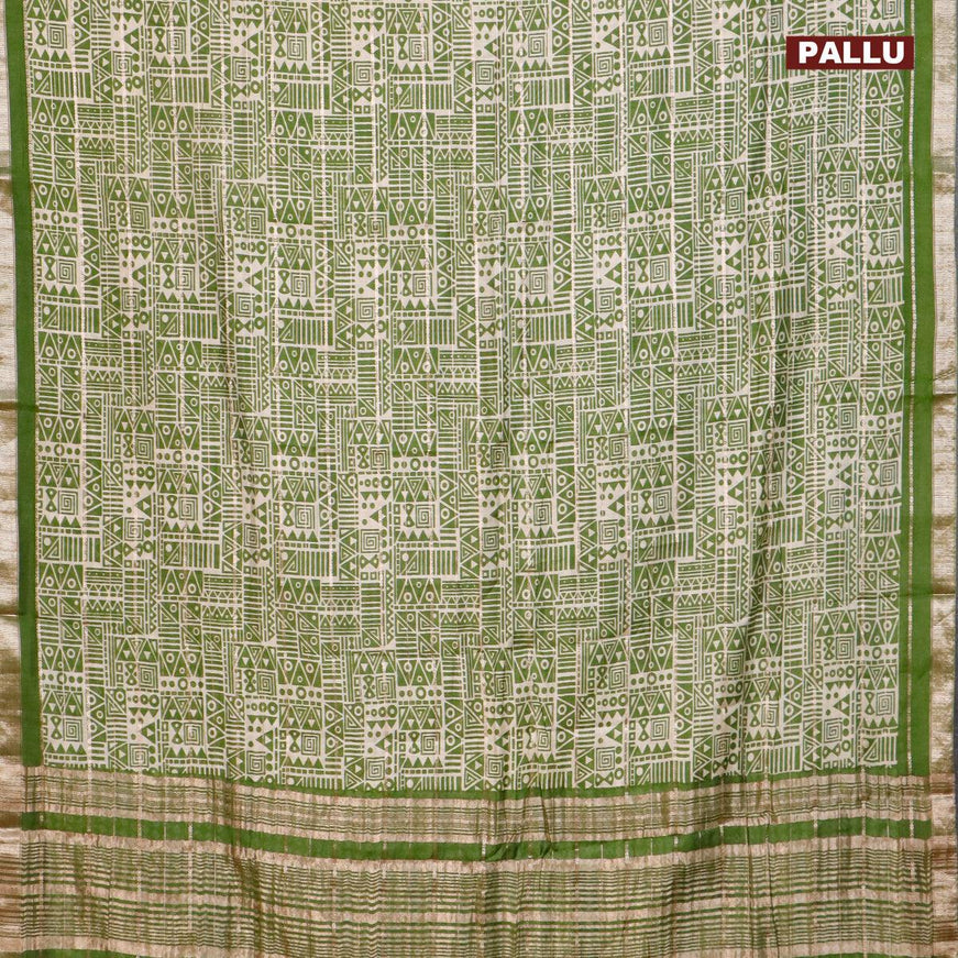 Semi gadwal saree cream and green with allover zari checks & geometric prints and zari woven border