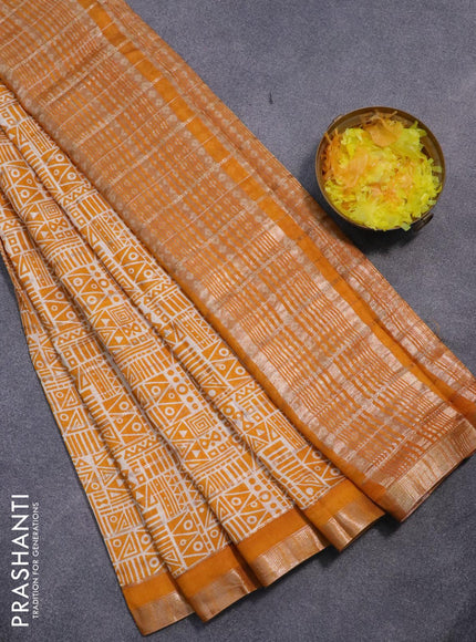 Semi gadwal saree cream and mustard yellow with allover zari checks & geometric prints and zari woven border