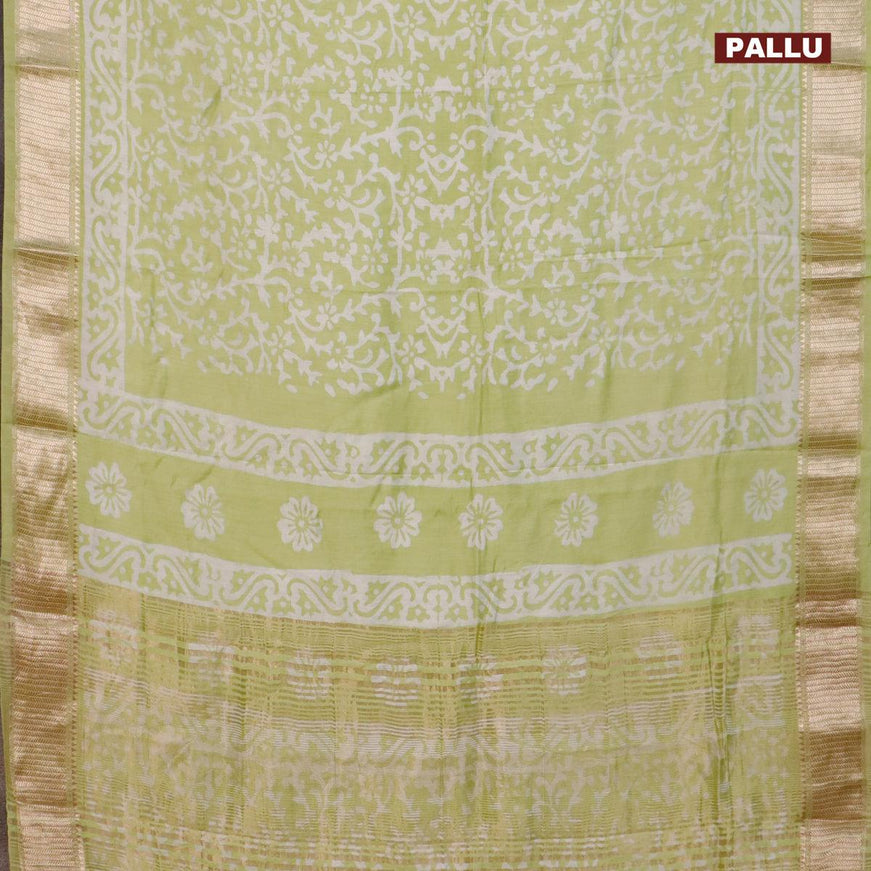 Semi gadwal saree pista green with allover batik prints and zari woven border