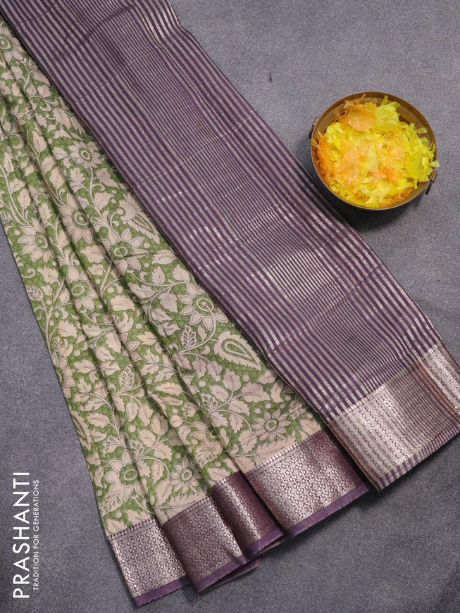 Semi gadwal saree green shade and jamun shade with allover floral prints and zari woven border