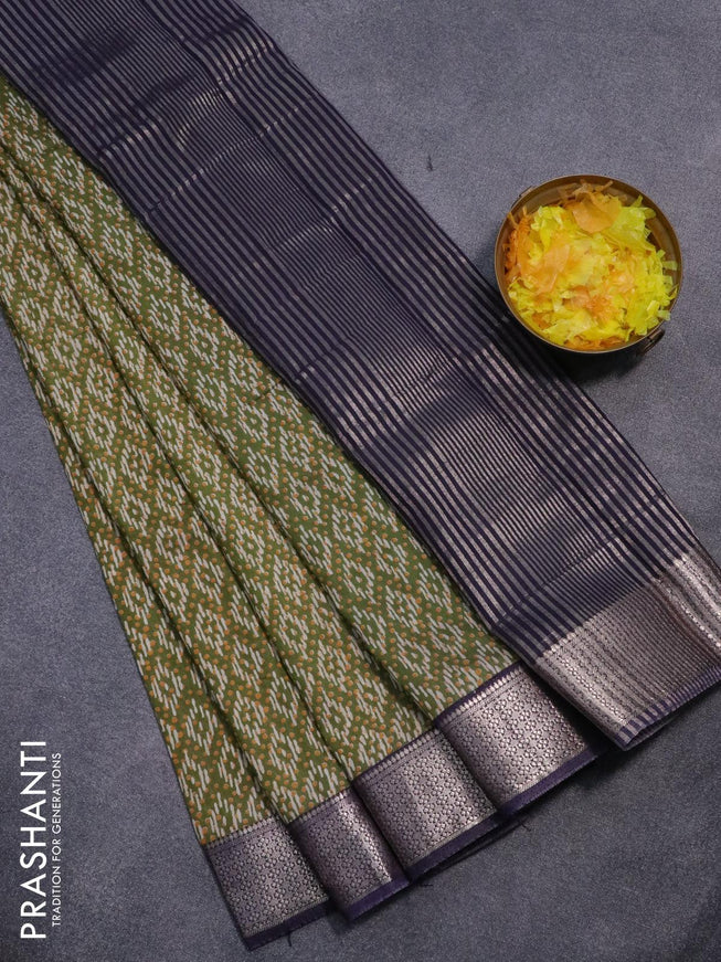 Semi gadwal saree green and jamun shade with allover prints and zari woven border