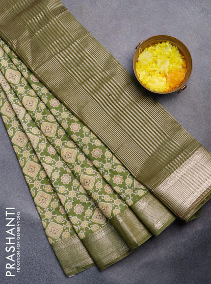 Semi gadwal saree green with allover ajrakh prints and zari woven border