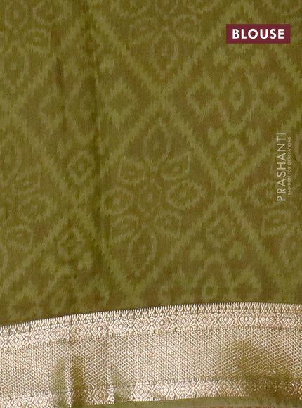 Semi gadwal saree green with allover ajrakh prints and zari woven border