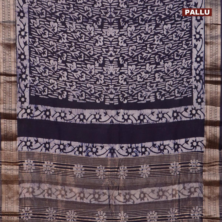 Semi gadwal saree navy blue and off white with allover batik prints and zari woven border