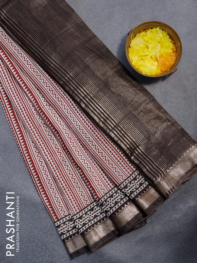 Semi gadwal saree off white maroon and black with allover geometric prints and zari woven border