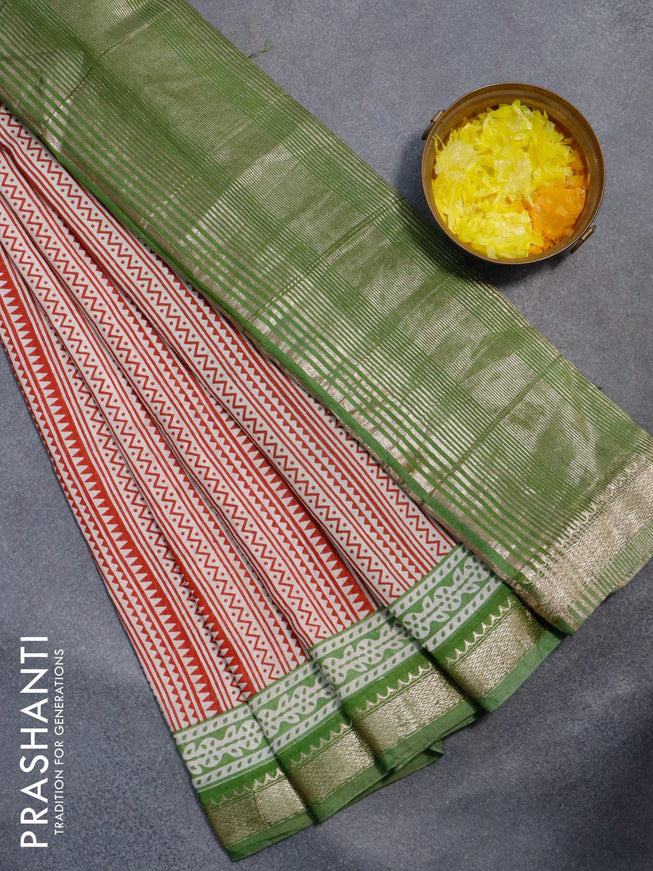 Semi gadwal saree cream red and green with allover geometric prints and zari woven border