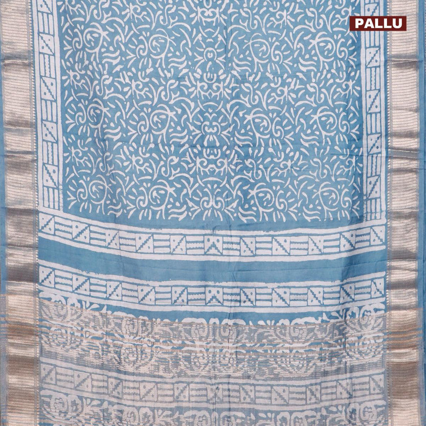 Semi gadwal saree pastel blue with allover batik prints and zari woven border