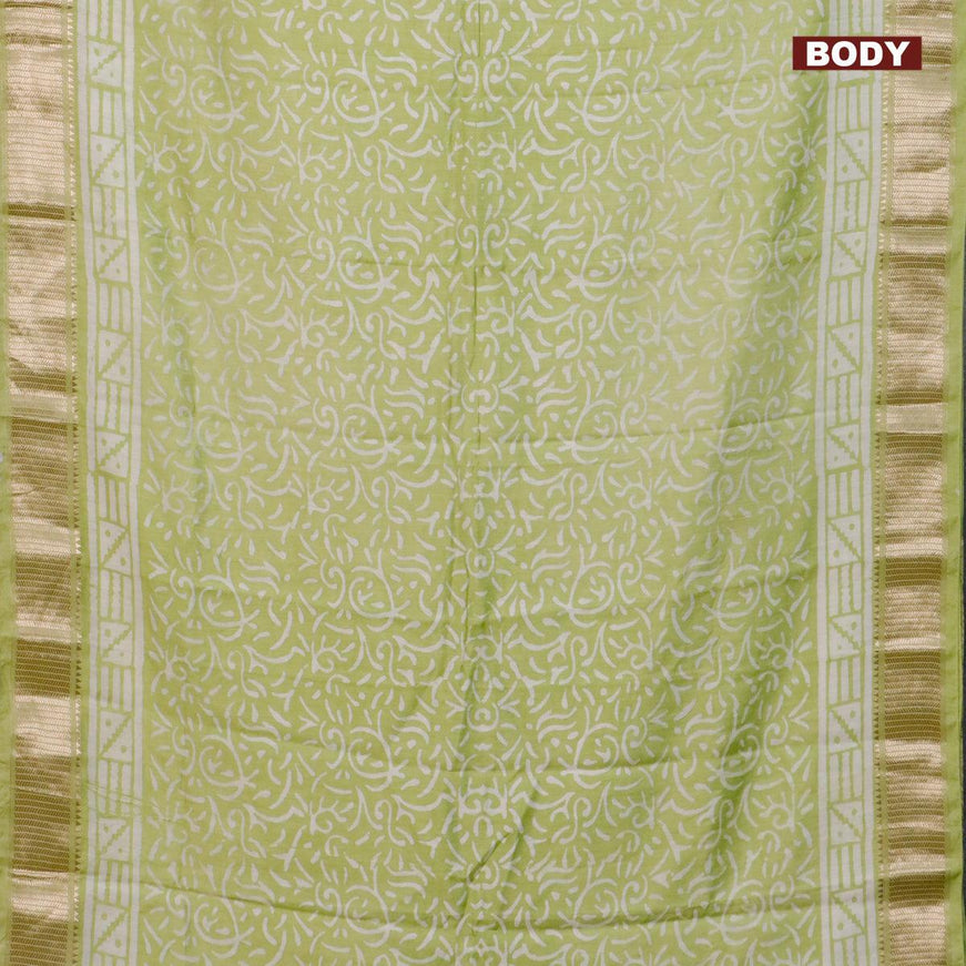 Semi gadwal saree pista green with allover batik prints and zari woven border