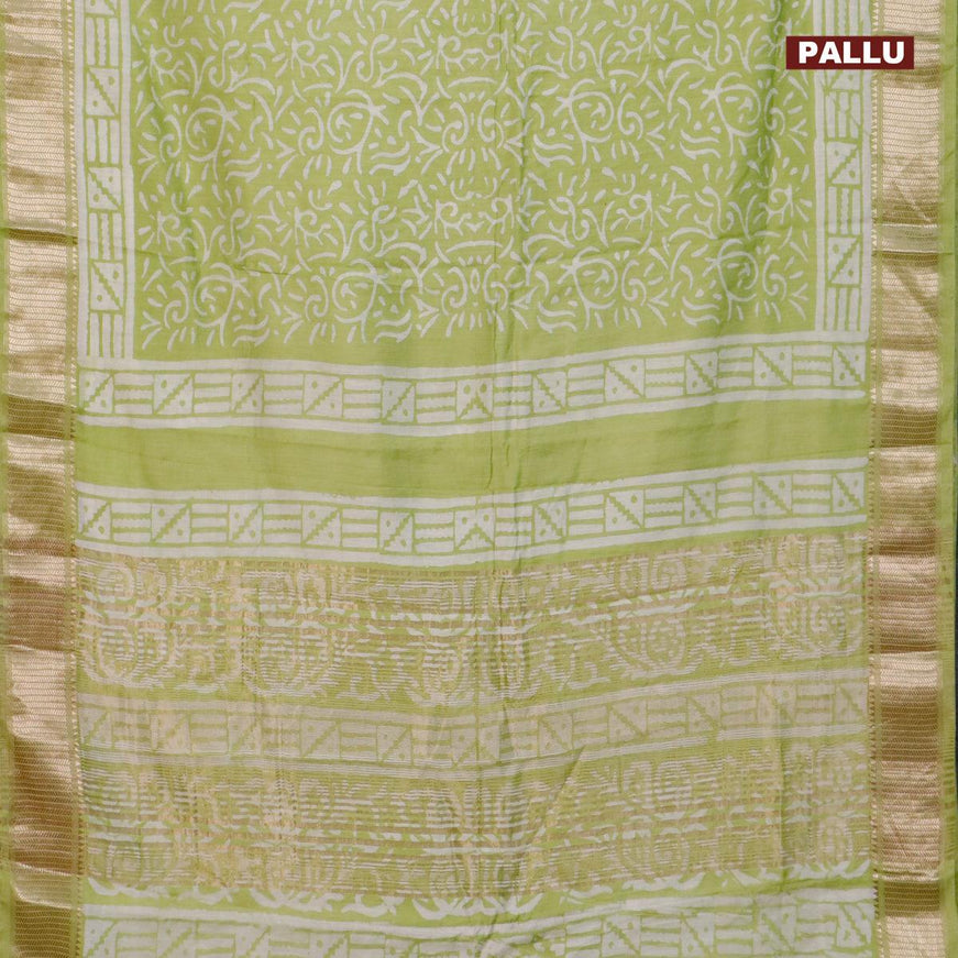 Semi gadwal saree pista green with allover batik prints and zari woven border