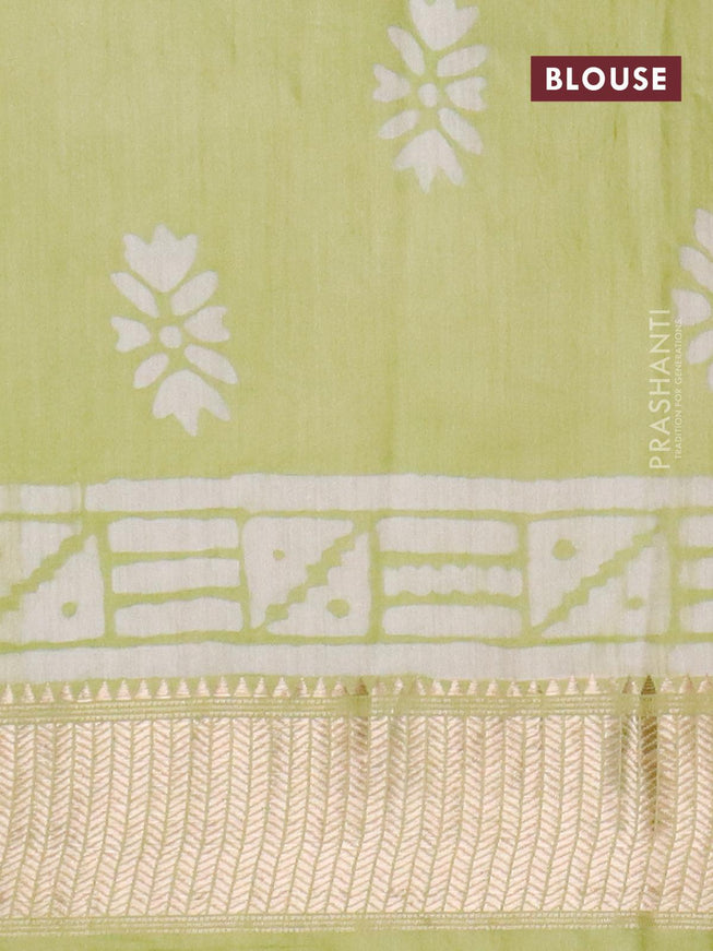 Semi gadwal saree pista green with allover batik prints and zari woven border