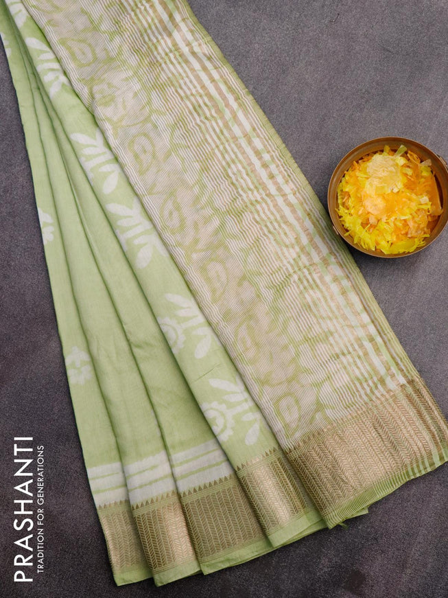 Semi gadwal saree pista green with floral butta prints and zari woven border