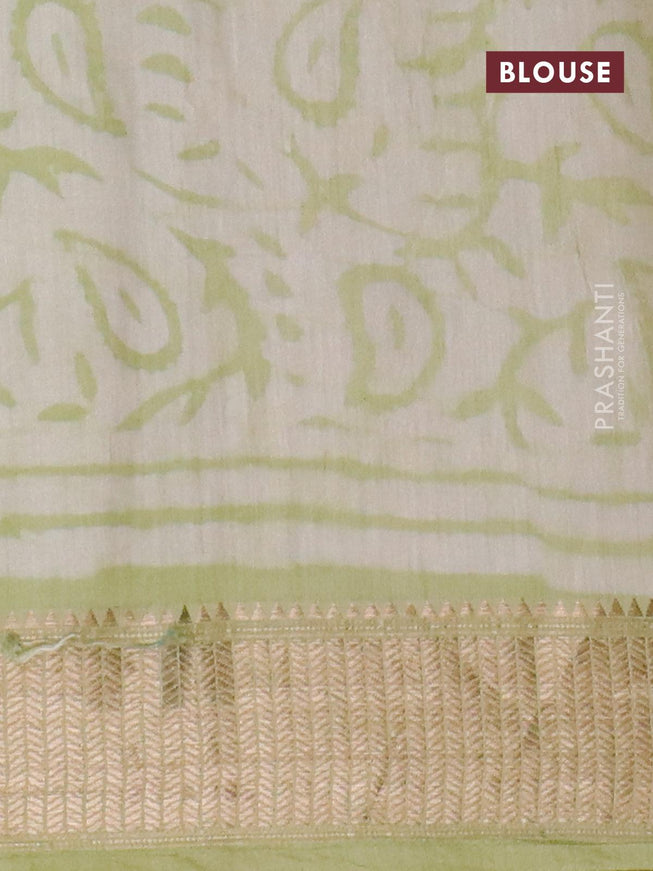 Semi gadwal saree pista green with floral butta prints and zari woven border