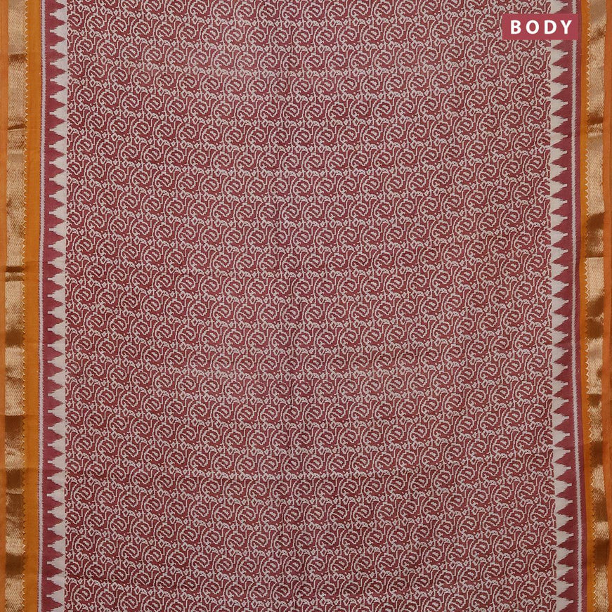 Semi gadwal saree pastel maroon and mustard yellow with allover paisley prints and zari woven border